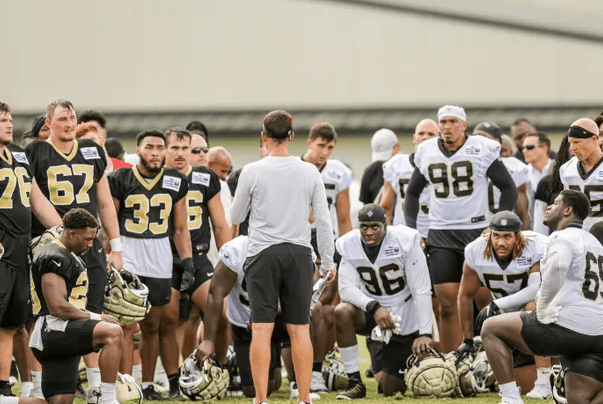 The New Orleans Saints Hold a Five-Minute Prayer for Cornerback Kris Boyd After He Was Attacked by an Aggressive Fan While Trying to Defend the Honor of the NFL. The Video of the Incident Has Left the Entire Football Community Outraged