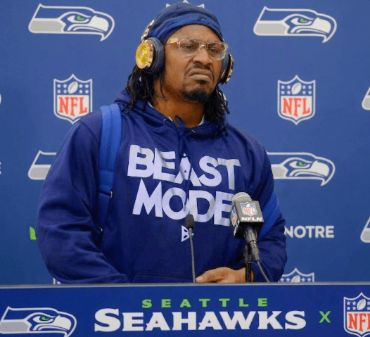 Beast Mode Marshawn Lynch Fires Back at Troy Aikman's "Match-Fixing" Accusation on Live ESPN – Igniting Massive Outrage in Seattle After 13-3 Seahawks Win Over 49ers
